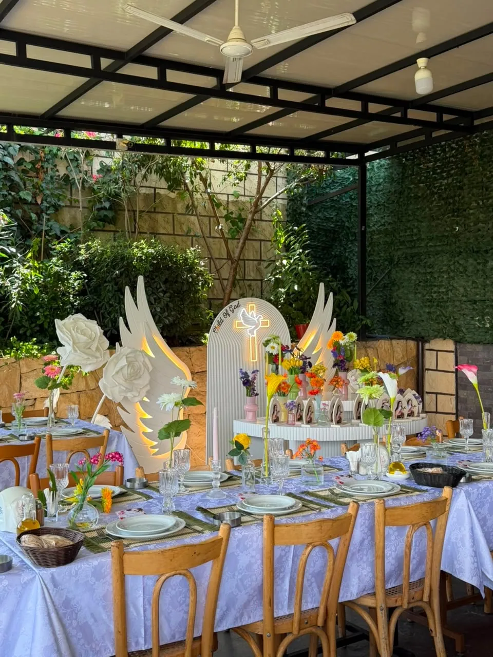Baptism decor with flowers and candles