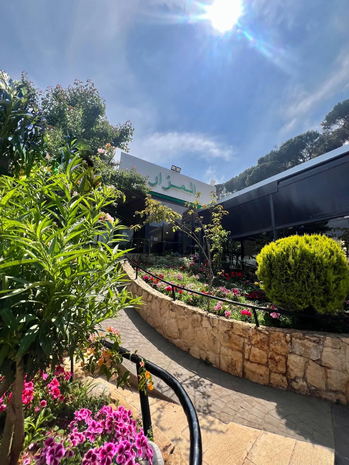 Flowers and planted walkway at Al Mazar